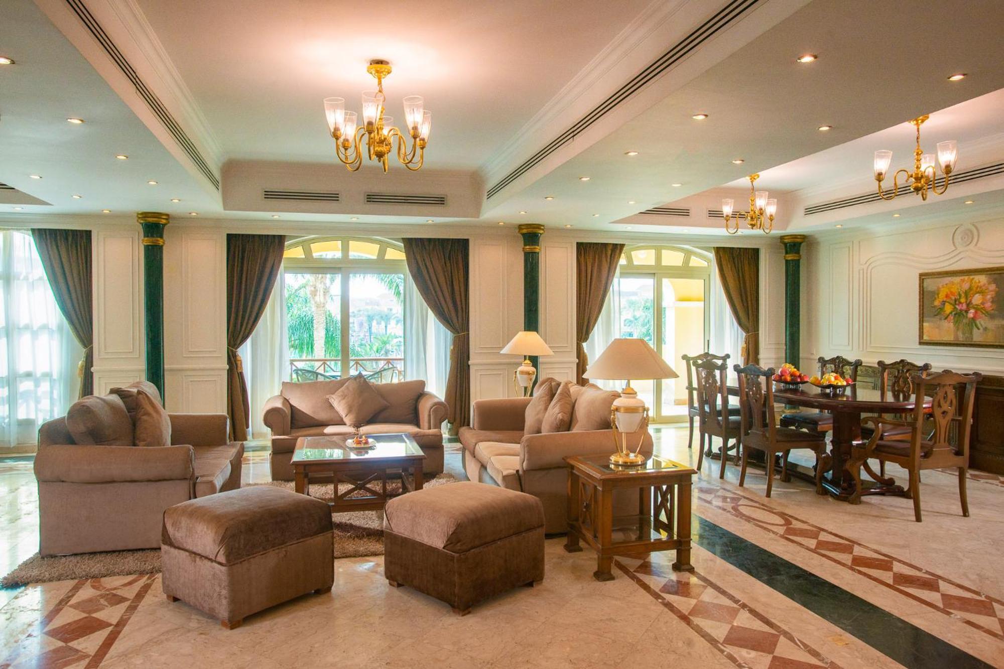 Moevenpick Hotel Cairo - Media City Giza Luaran gambar A living room in a luxury villa